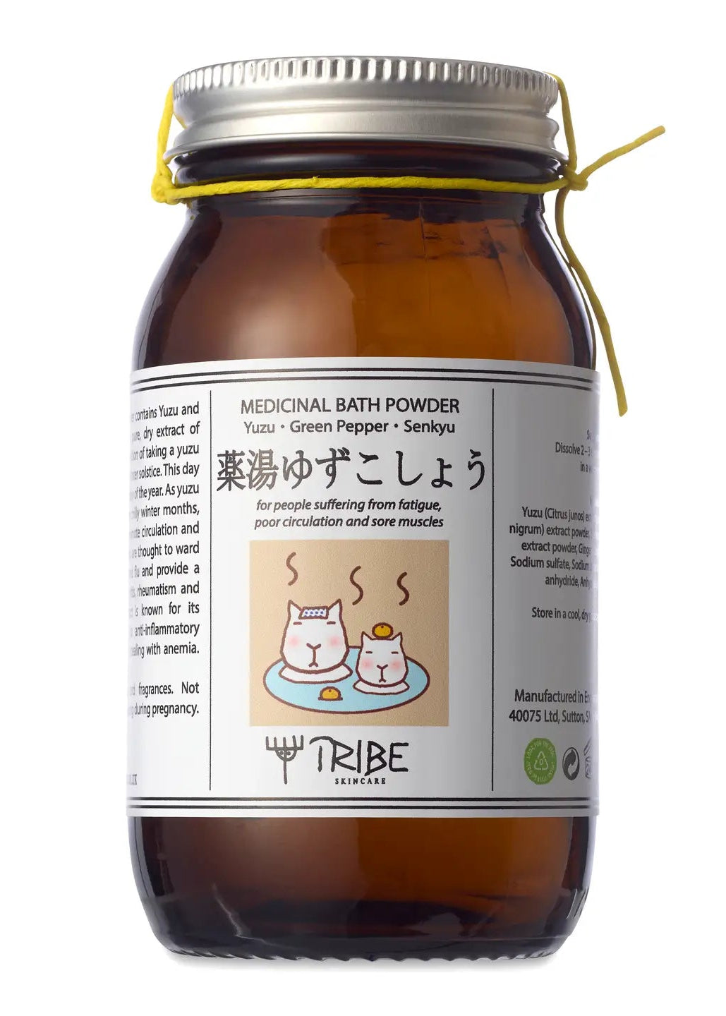 brown glass jar with with label containing informational text and cat illustration