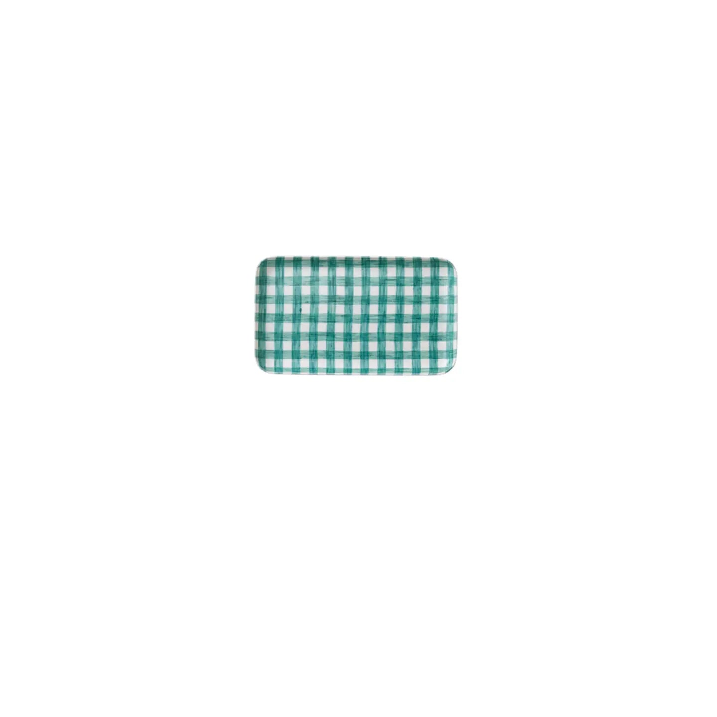 Green and white checkered mat on a white background