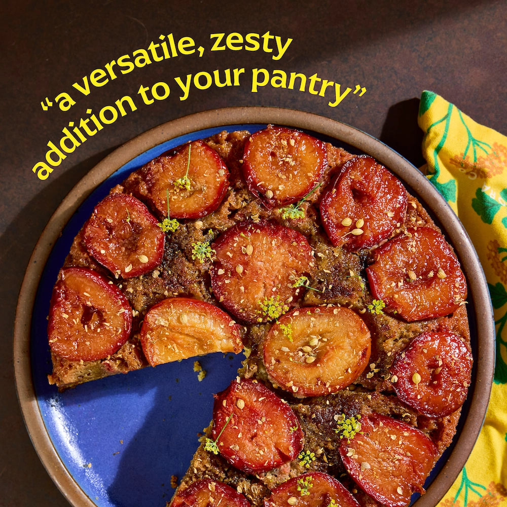 Dish with cake and text 'versatile, zesty addition to your pantry' on a dark background