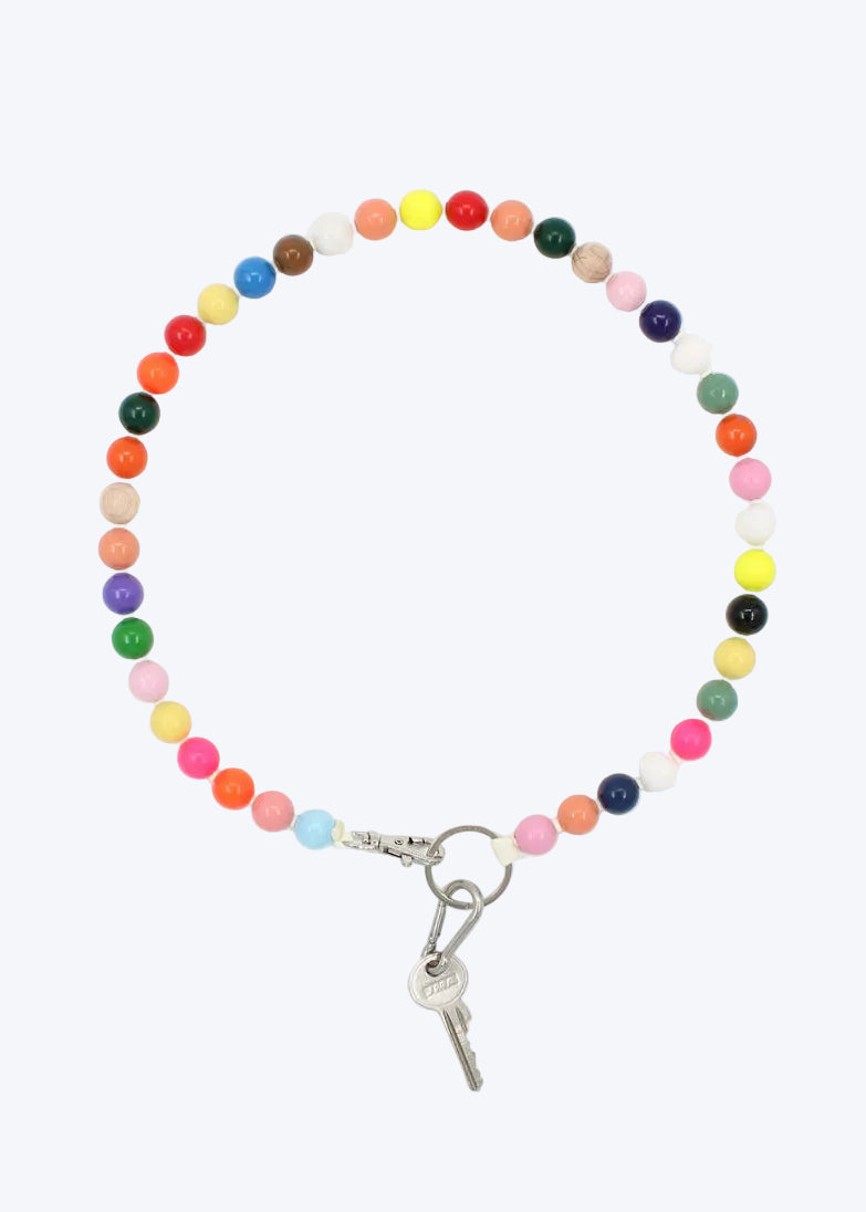 Colorful beaded keychain on a white background