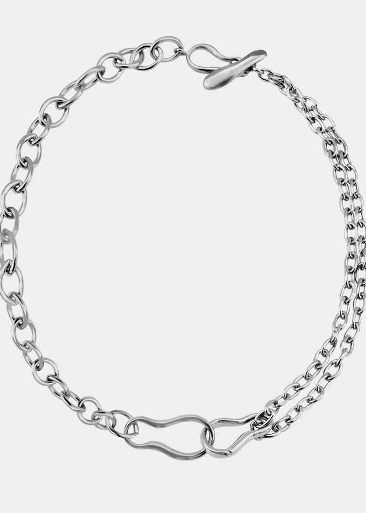 silver chain necklace on white background