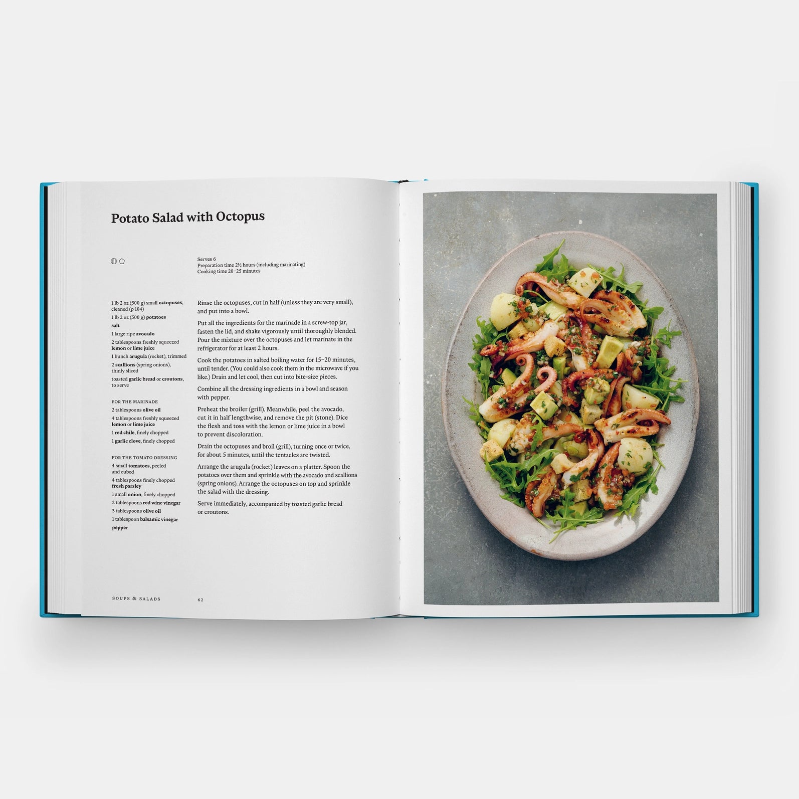 Open cookbook showing a recipe for Potato Salad with Octopus
