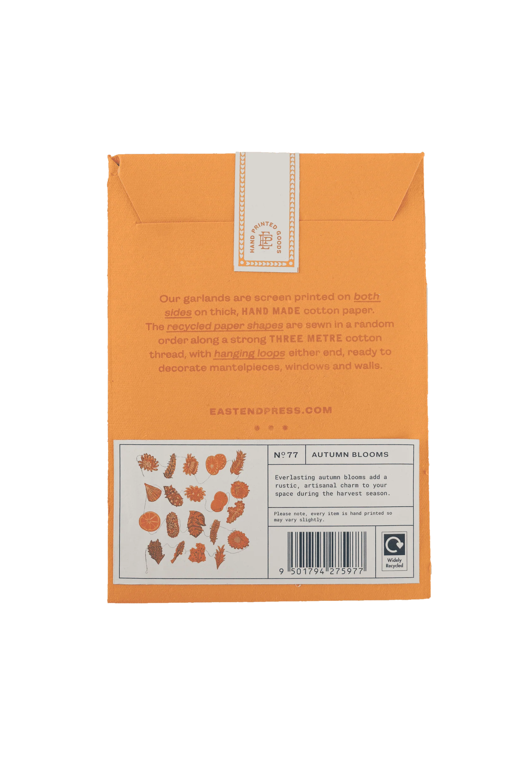 The back of an orange paper envelope-style package from Eastend Press, showing product information, a barcode, and printed botanical illustrations on a white background.