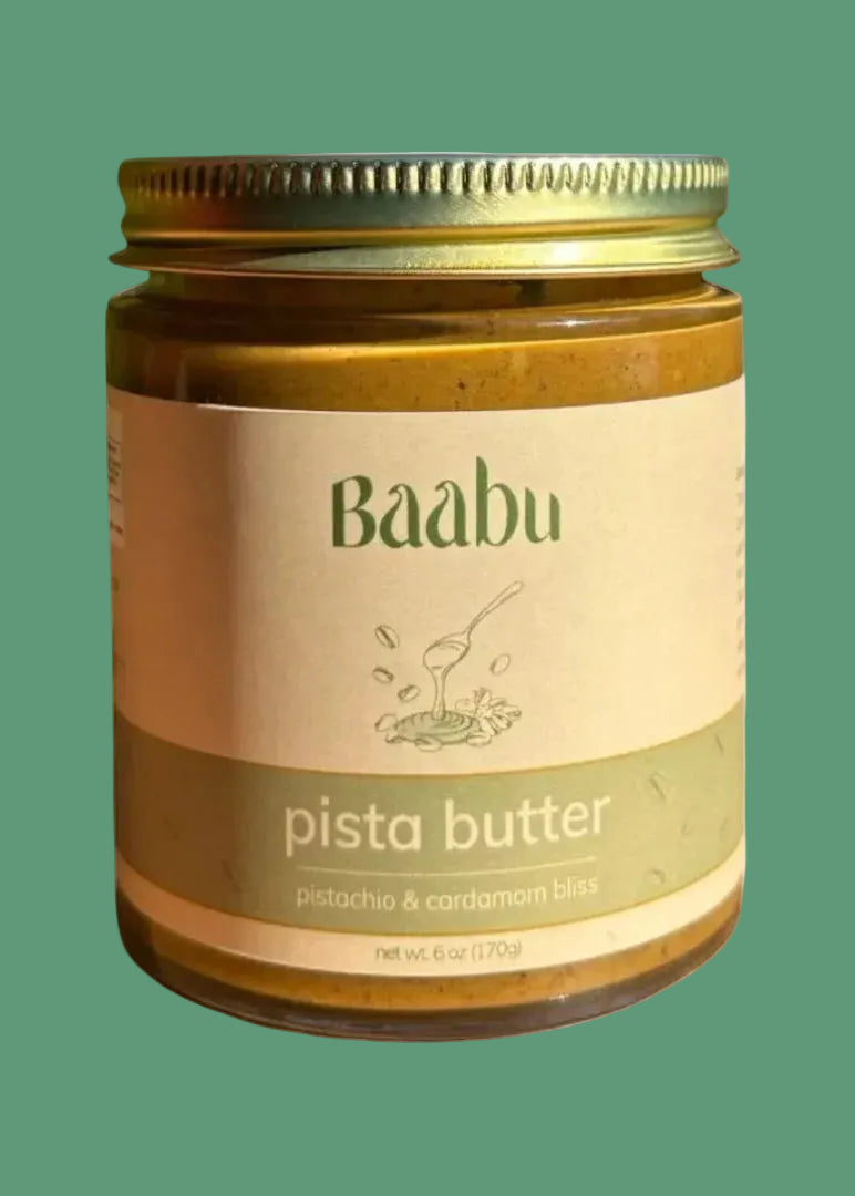 Jar of Baabu pista butter on a white background