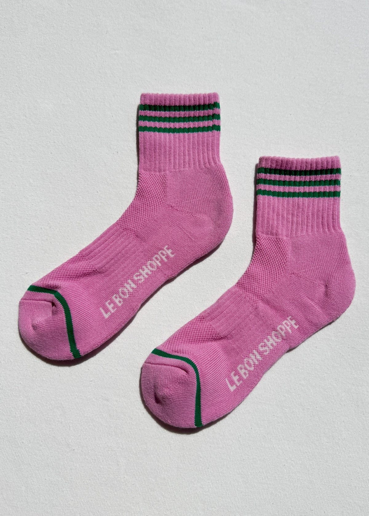 pink socks with green stripes