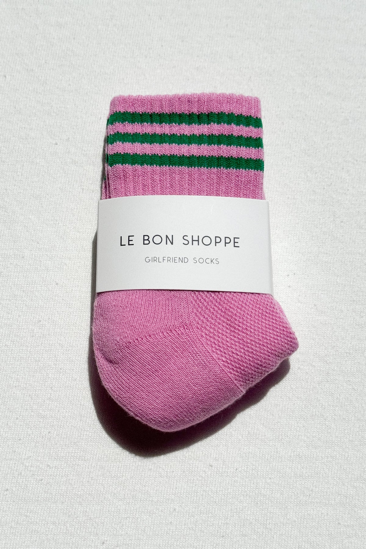 pink socks with green stripes