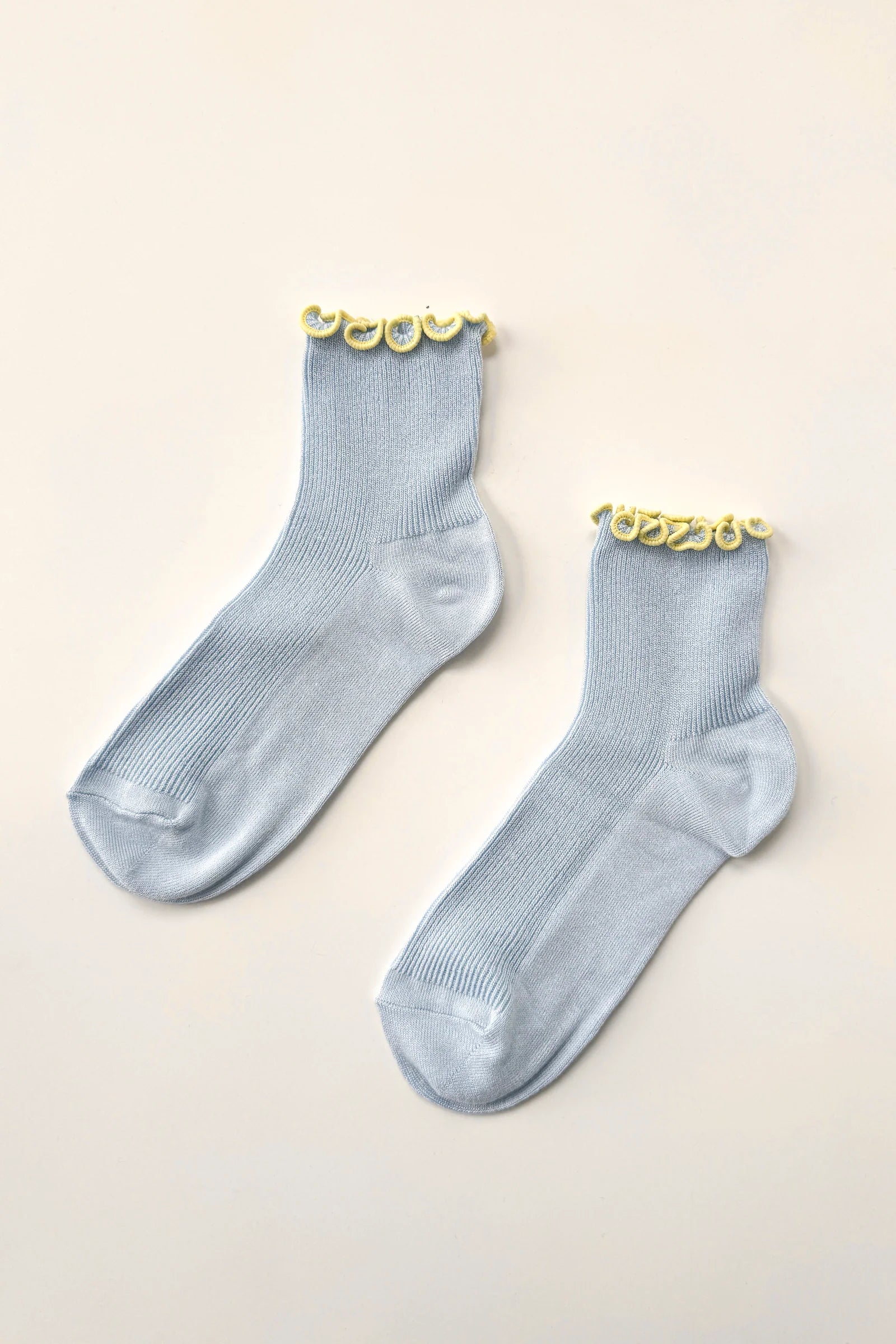 baby blue socks with butter ruffles
