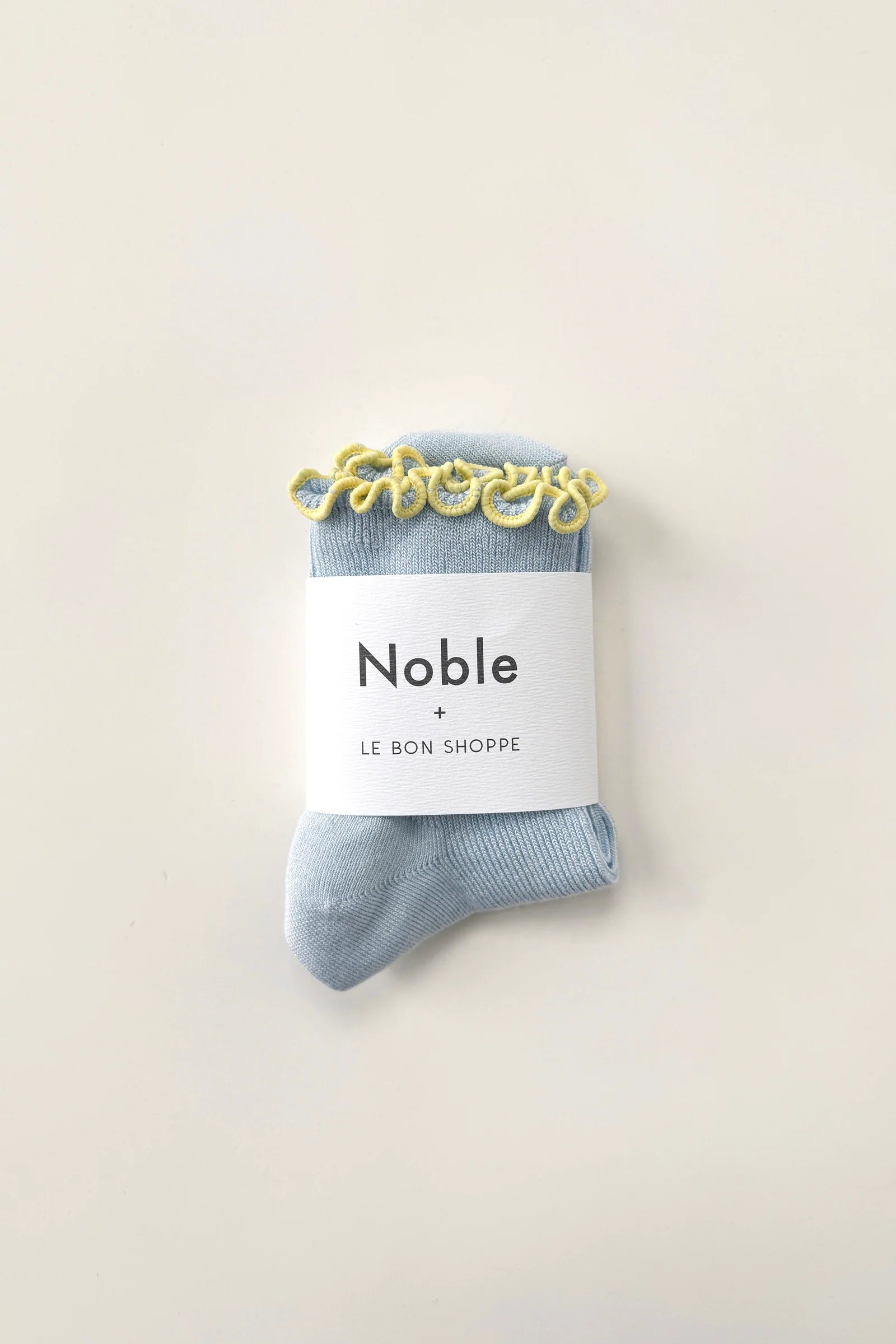 baby blue socks with butter ruffles