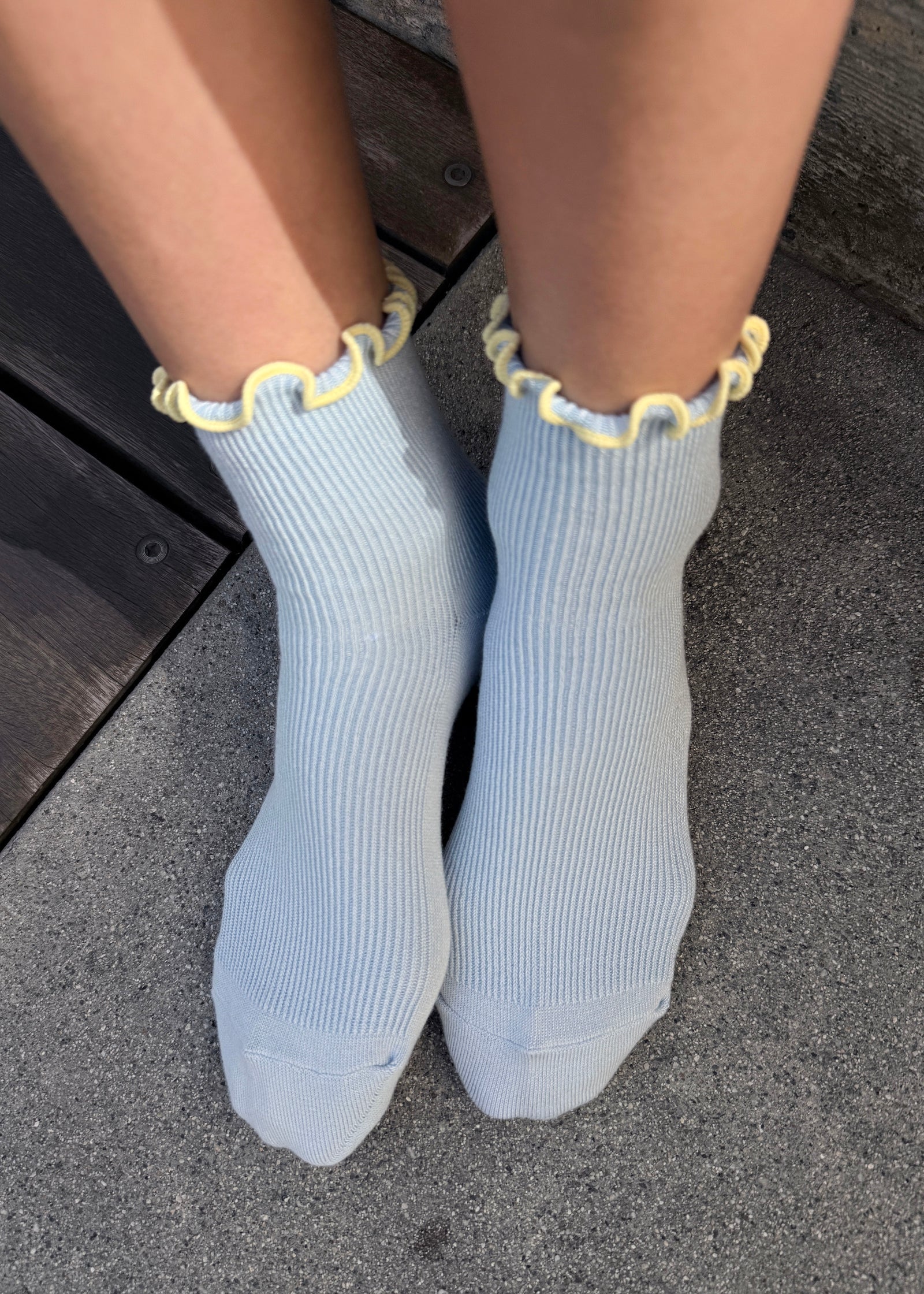 baby blue socks with butter ruffles