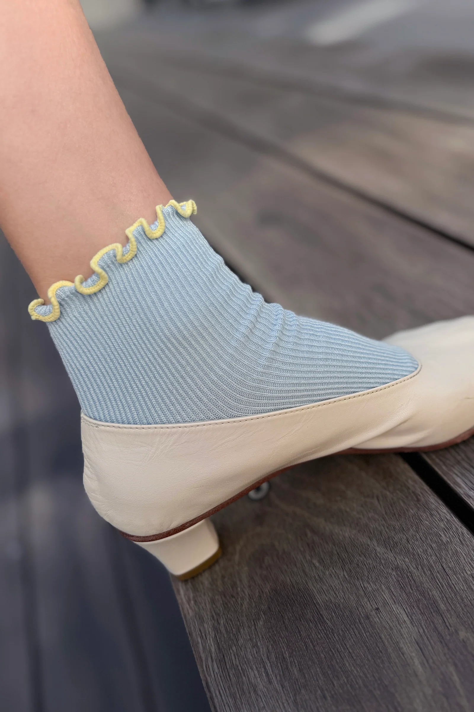 baby blue socks with butter ruffles