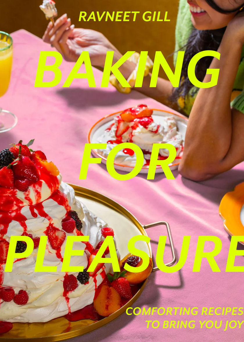 book cover with pink tablecloth neon yellow writing and fruit pavlova