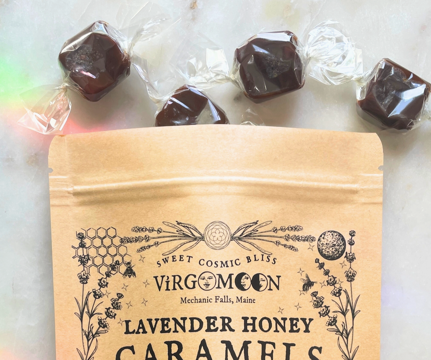 Bag of VirgMoon lavender honey caramels on a white surface