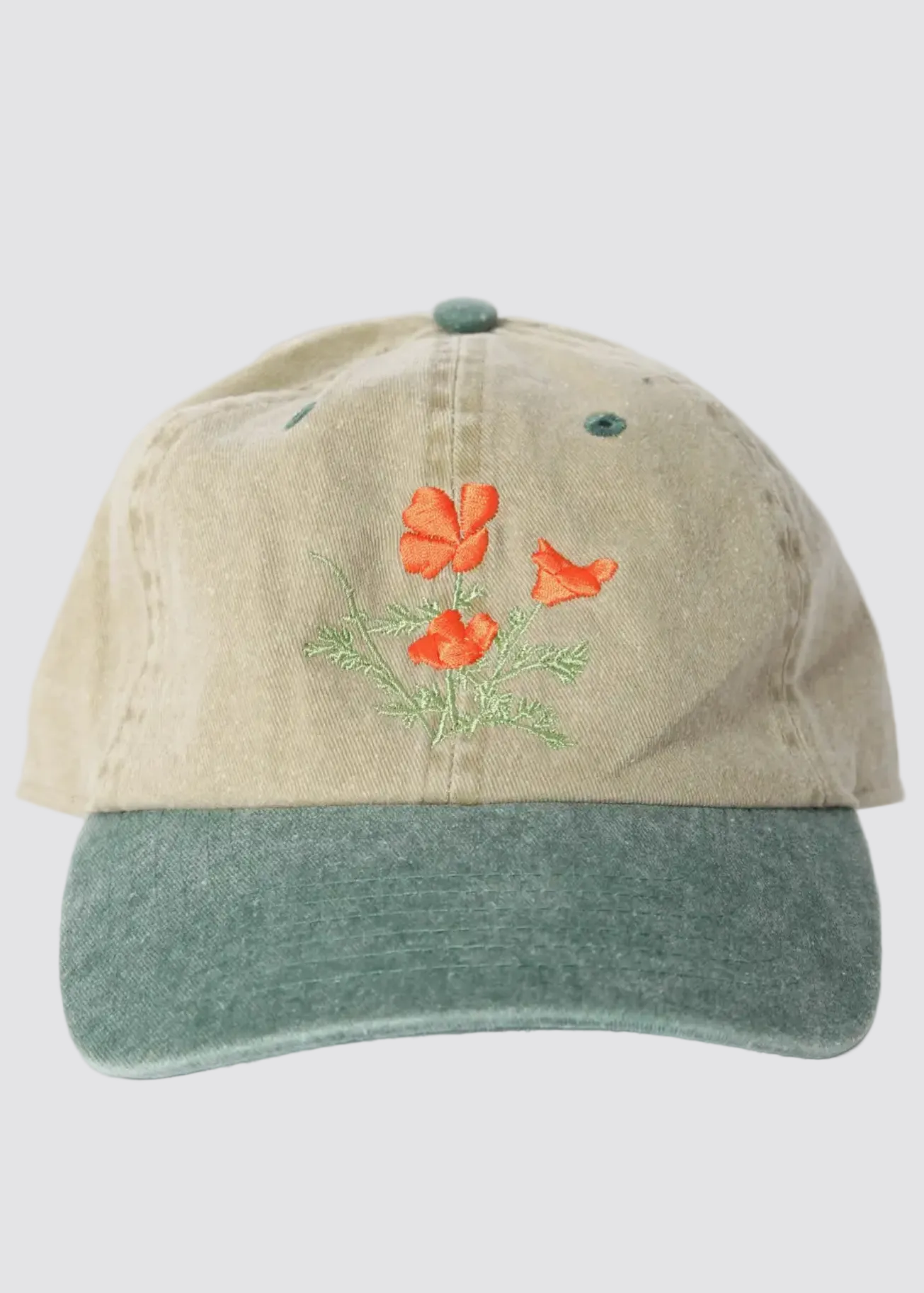 Beige cap with embroidered flowers on a white background