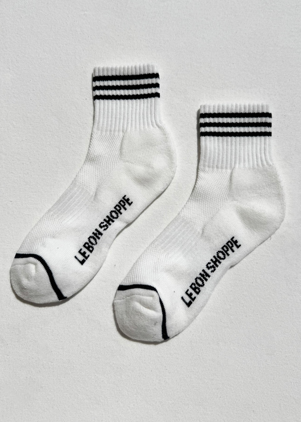 white crew socks with black stripes