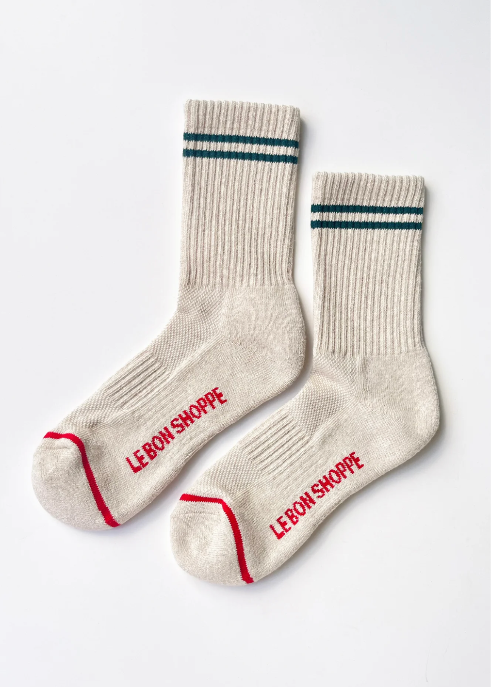 oatmeal socks with green stripes and red details