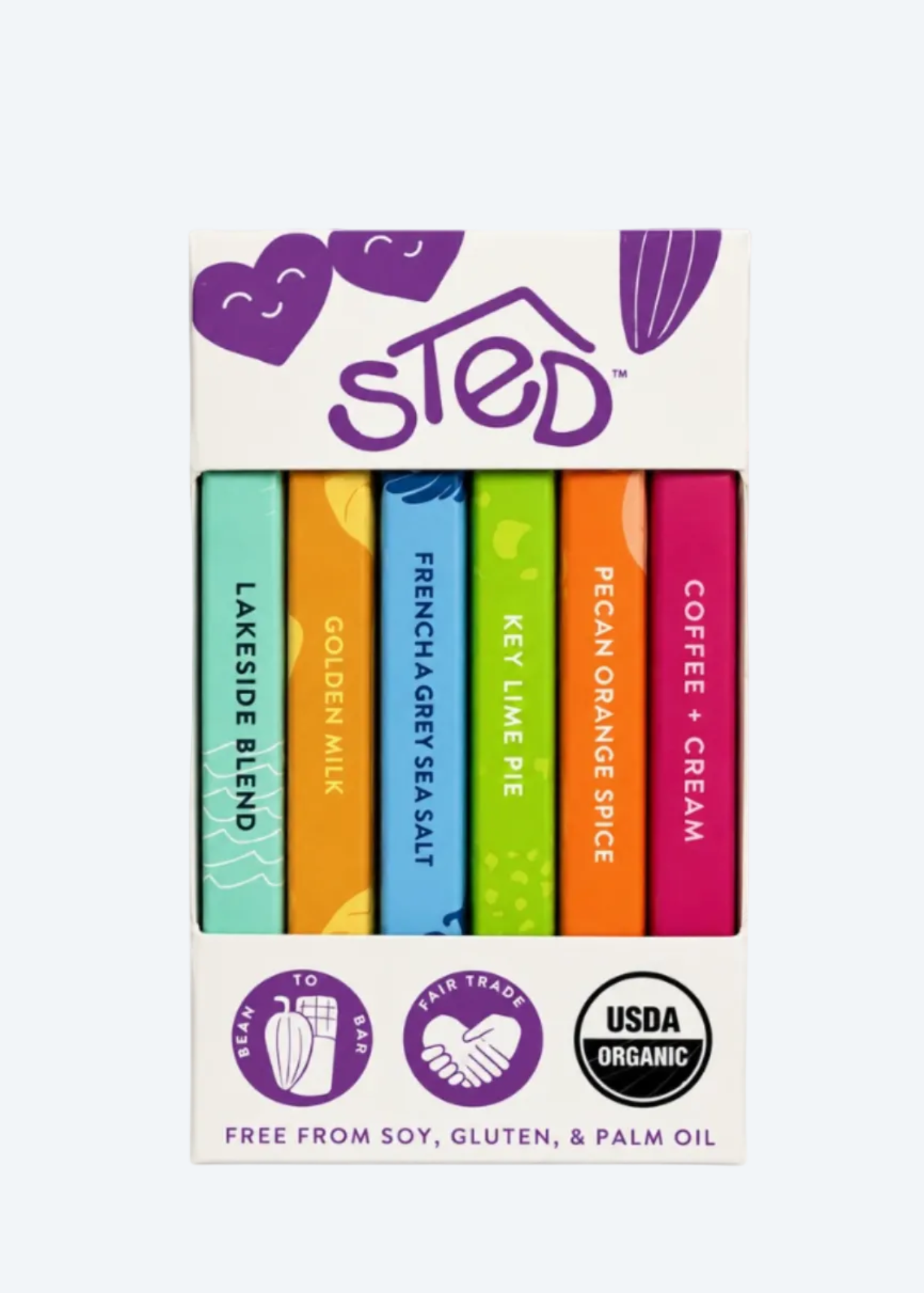A boxed set of Sted mini chocolate bars shown on a white background. The package contains five colorful bars labeled Lakeside Blend, Golden Milk, French Grey Sea Salt, Key Lime Pie, and Pecan Orange Pie, with a pink bar labeled Coffee + Cream.