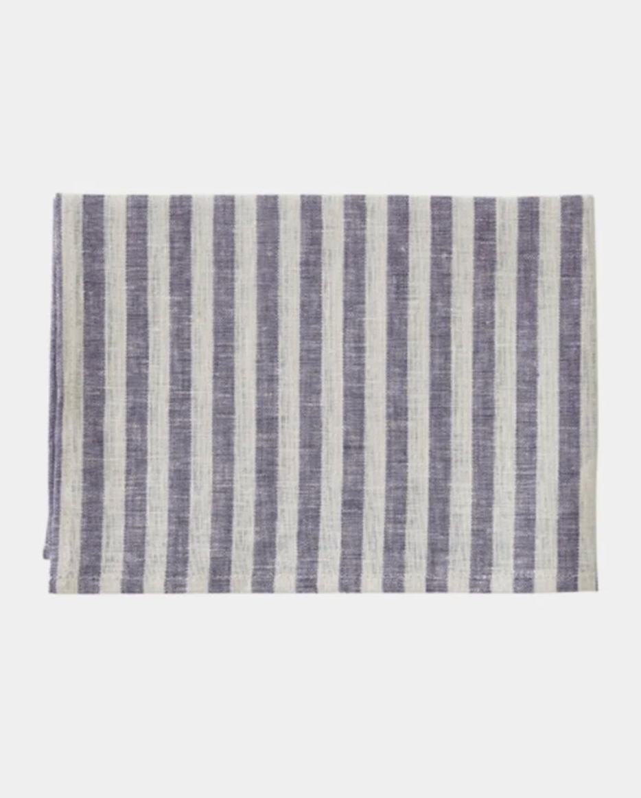 A folded woven textile shown against a plain light gray background.