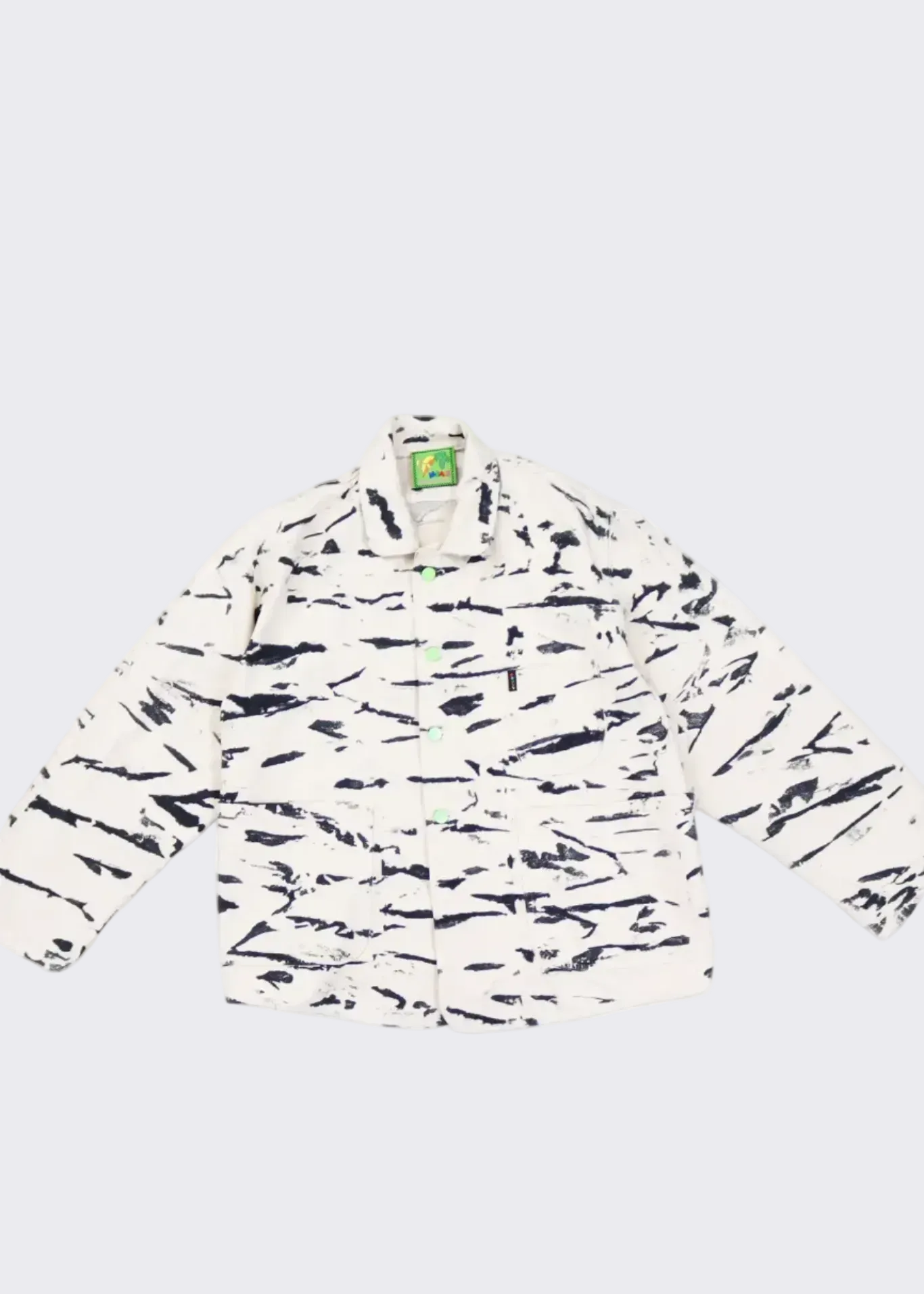 A long-sleeve button-up jacket with an abstract black brushstroke pattern 