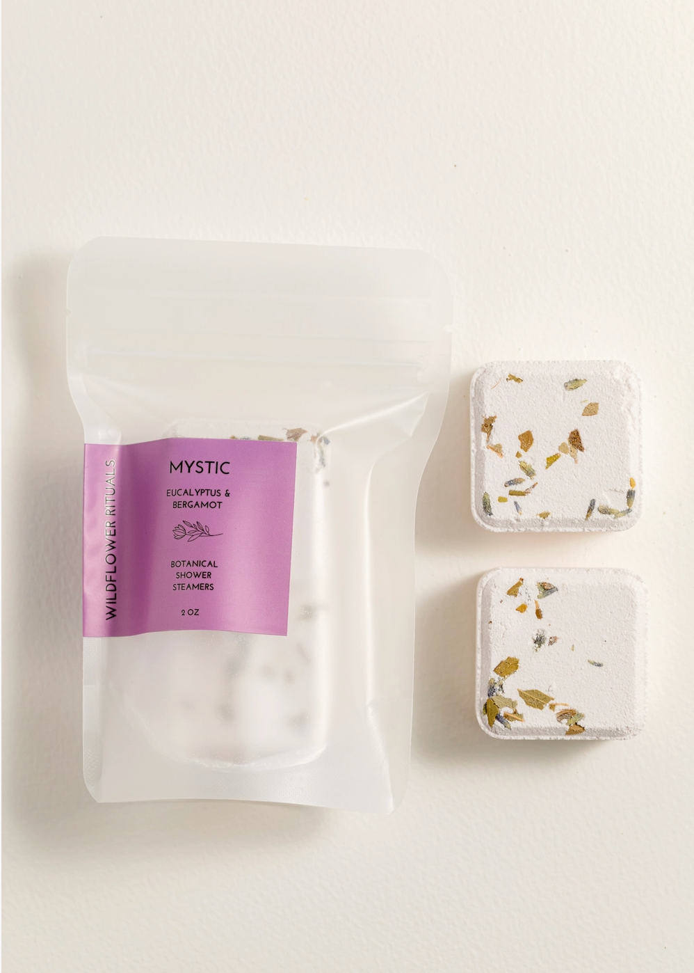 packaged goods next to two shower steamers