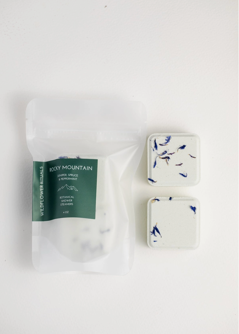 packaged goods next to two shower steamers