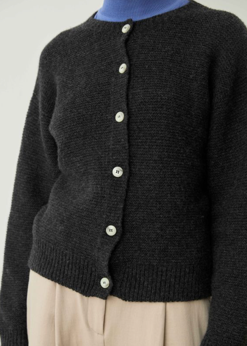 charcoal cardigan with white buttons