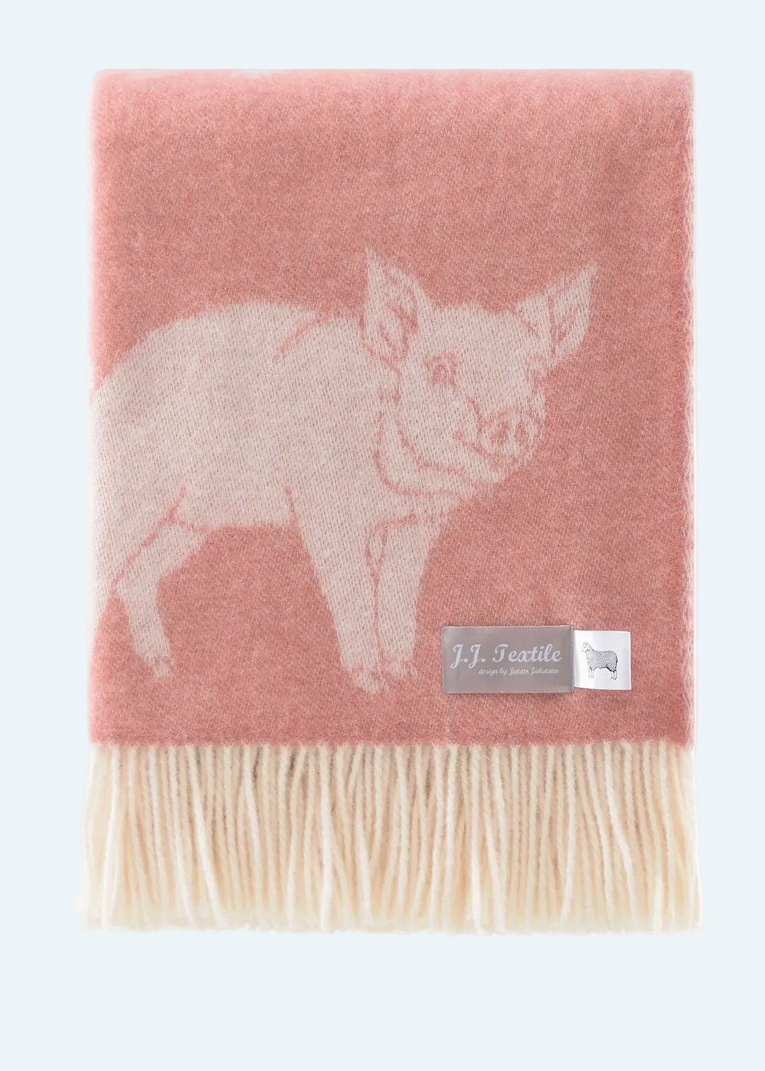 pink blanket with piglet design and white fringe