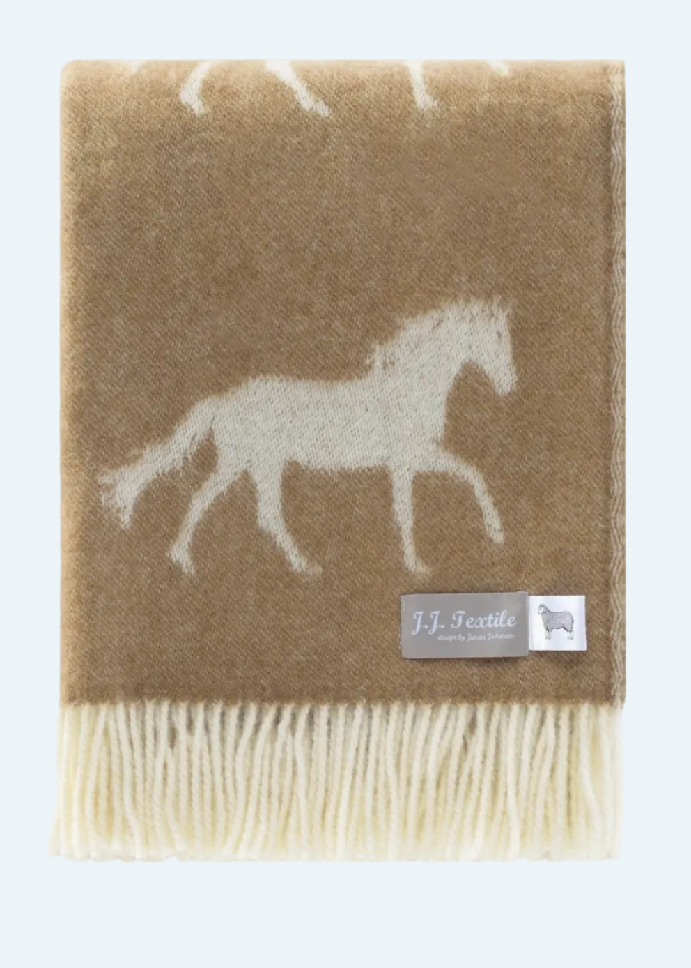 brown throw with horse and fringe