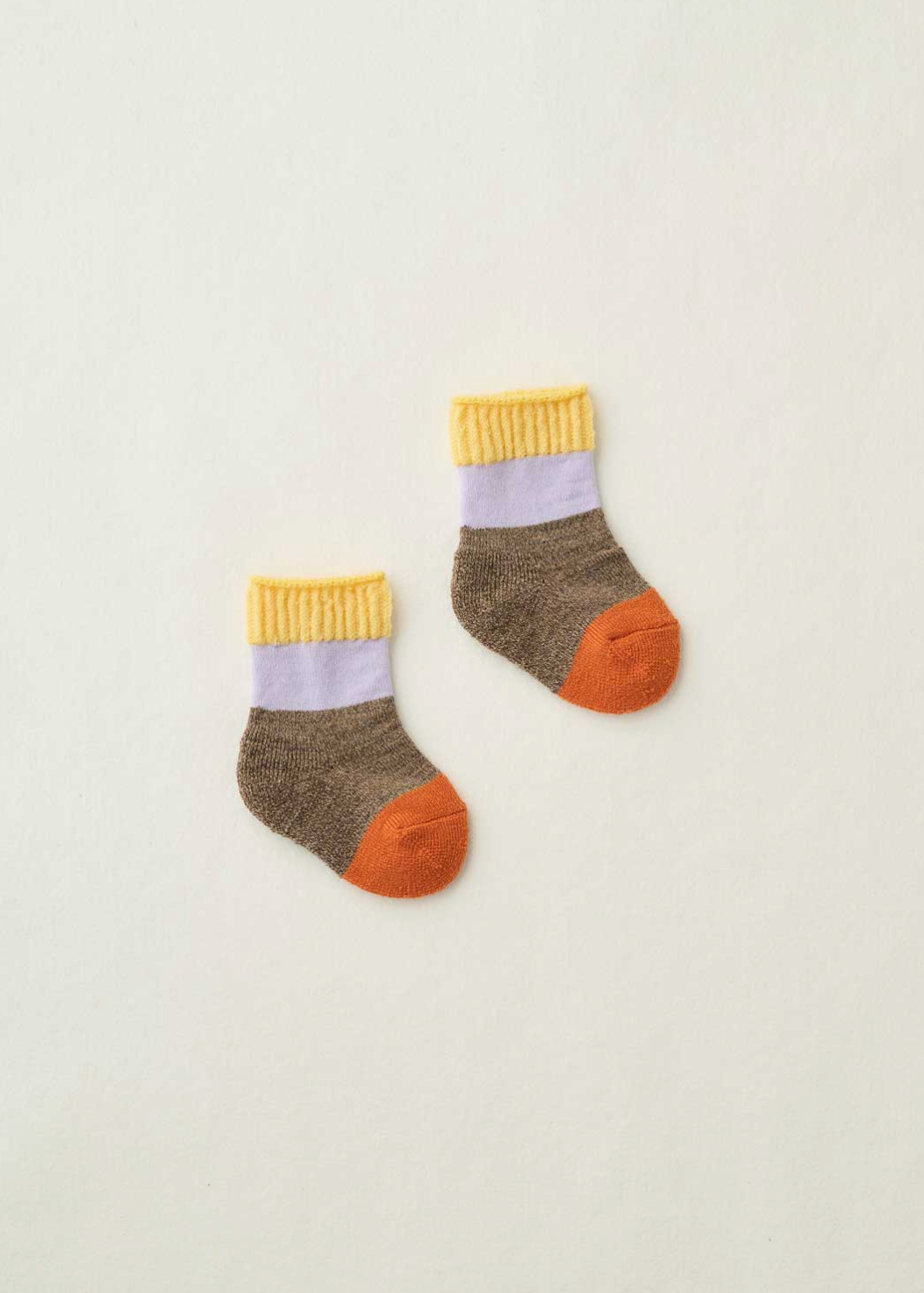yellow, purple, brown, orange baby socks