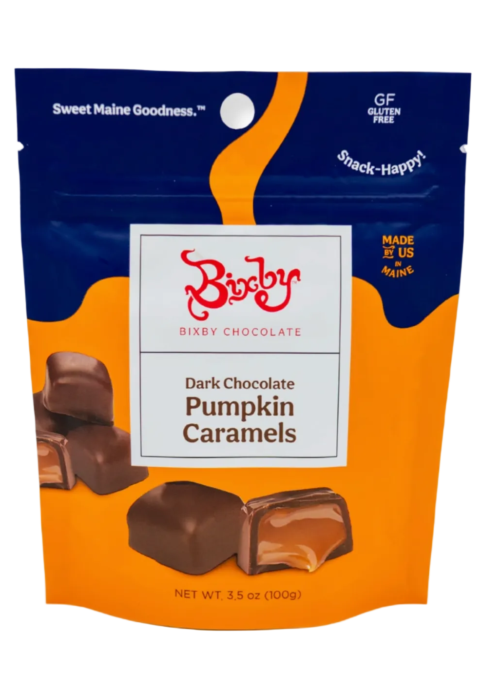 A 3.5 oz stand-up pouch of Bixby Chocolate Dark Chocolate Pumpkin Caramels, featuring a navy blue top section and a bright orange lower section with product imagery.