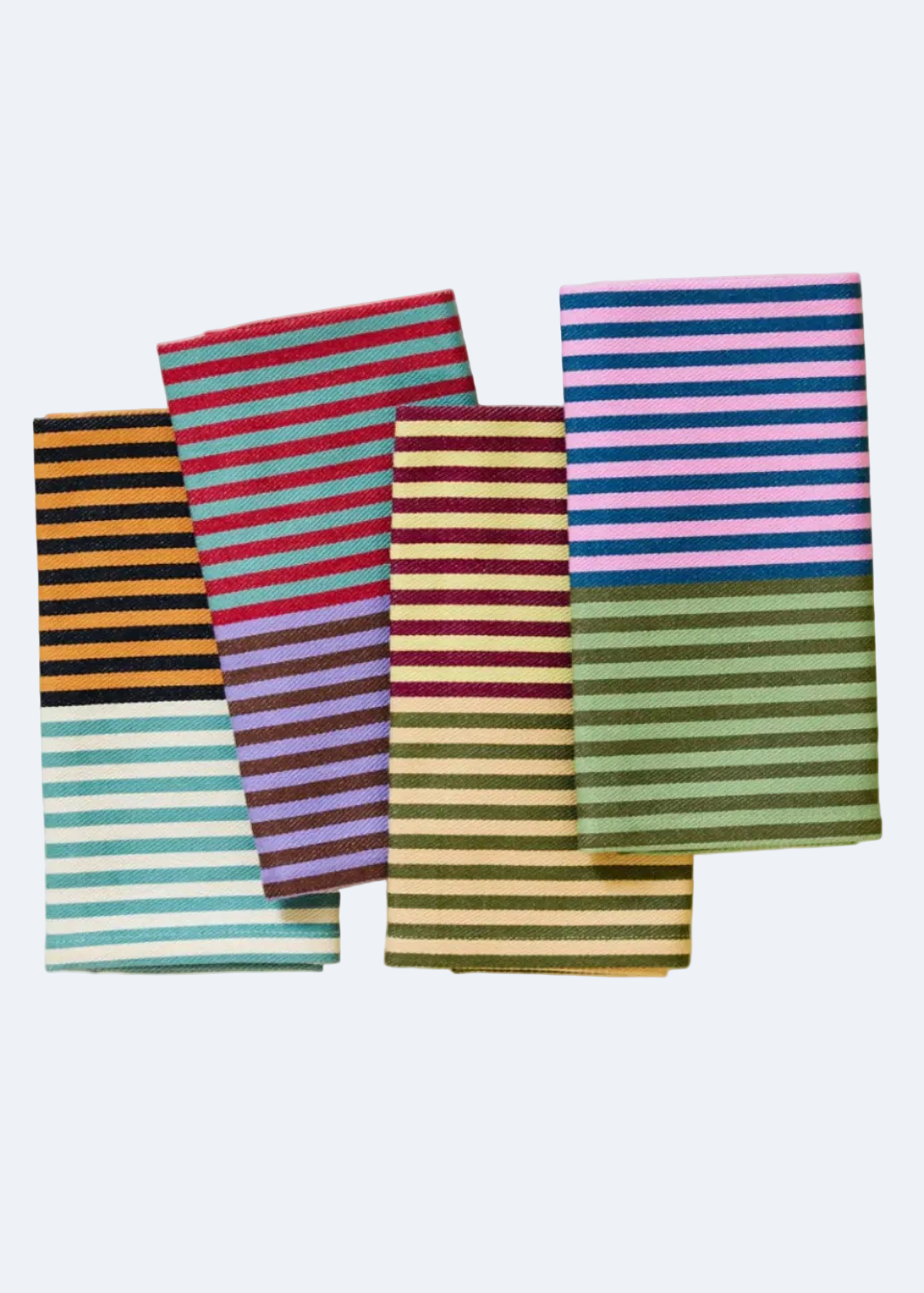 Set of colorful striped towels on a white background
