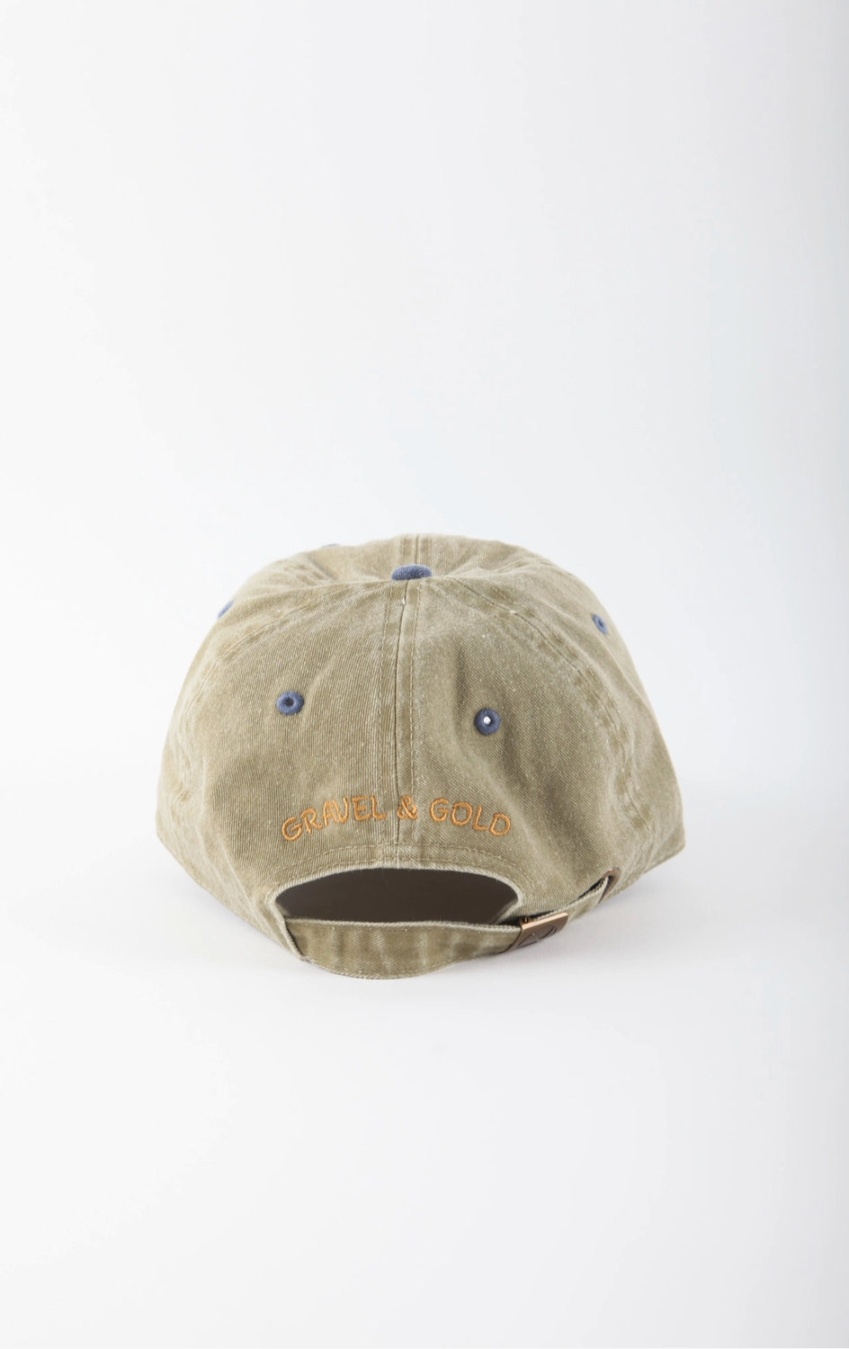 Beige cap with branding on a white background