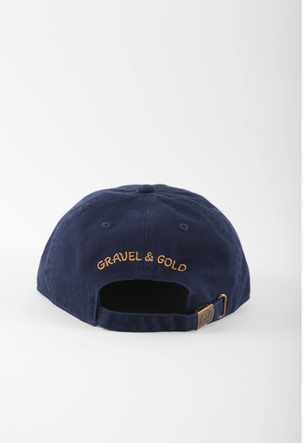 Navy blue cap with 'Gravel & Gold' embroidery on a white background