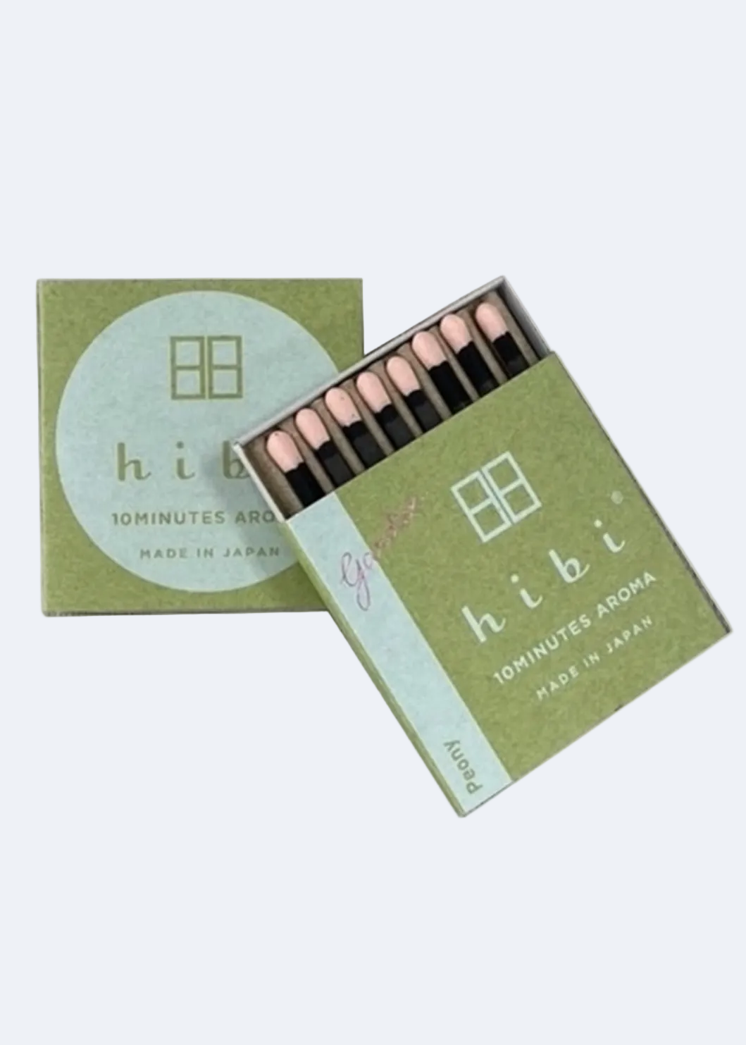 Hibi incense sticks in a green box on a white background