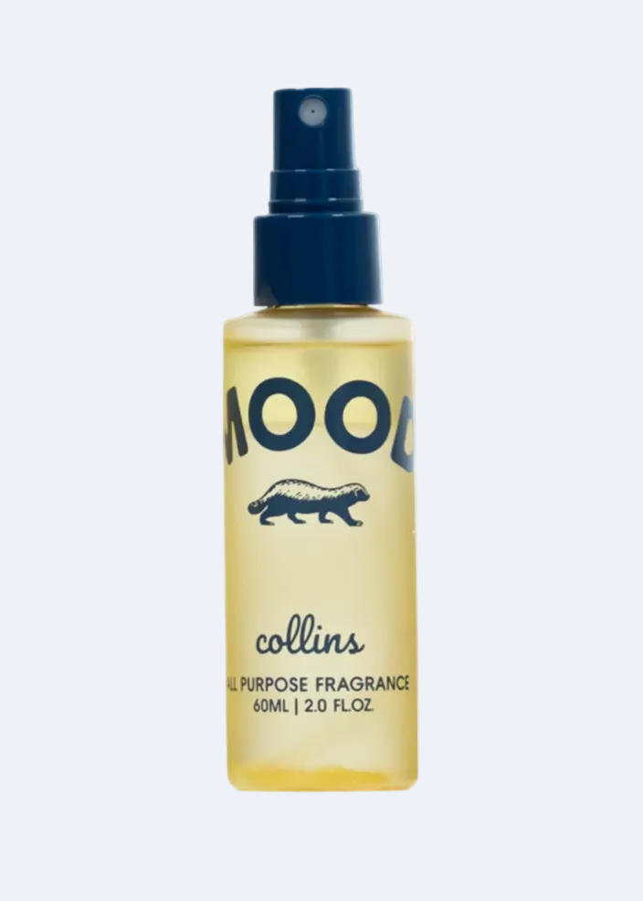 Bottle of MOOD collins fragrance on a white background