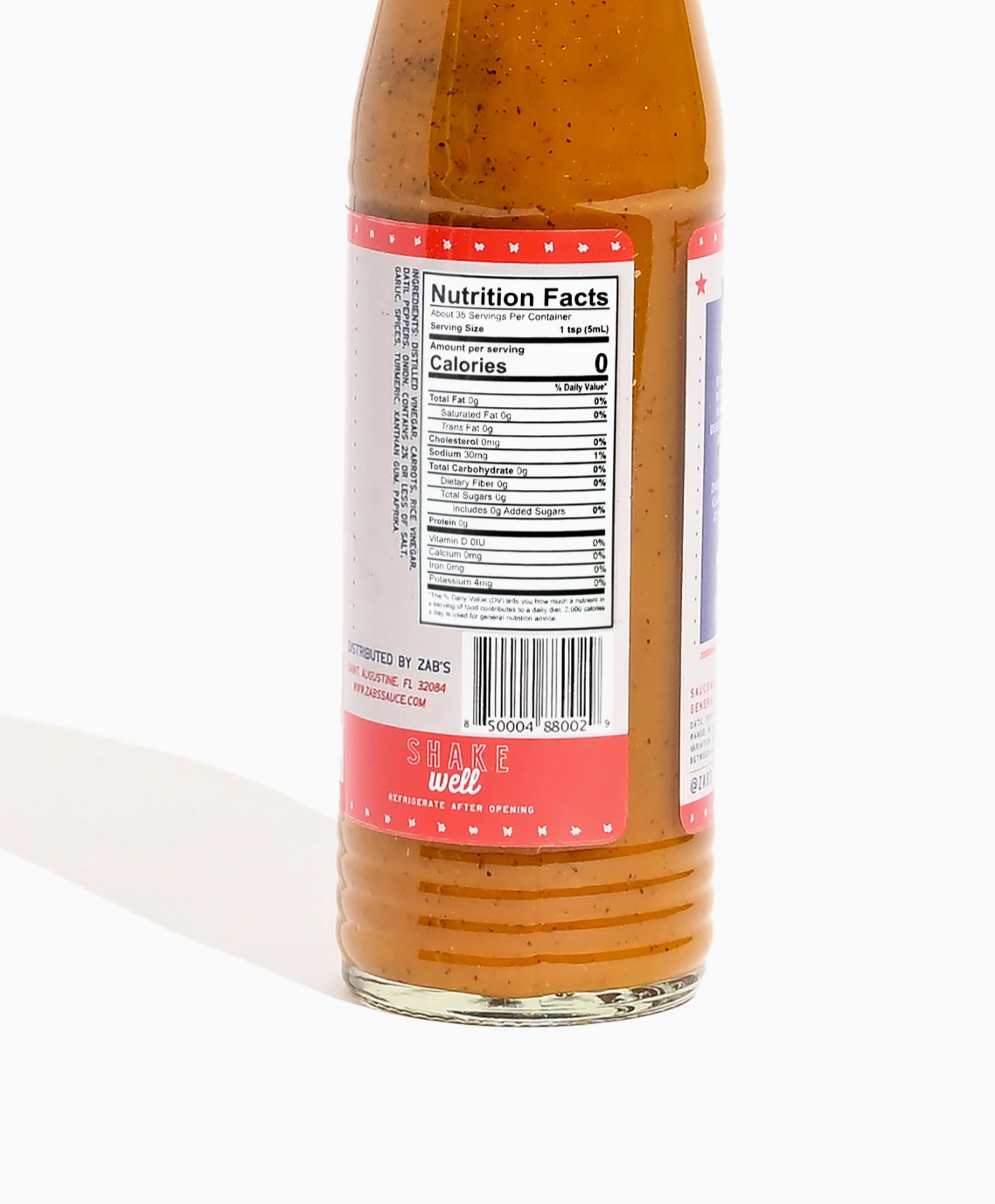 Bottle with nutrition label on a white background