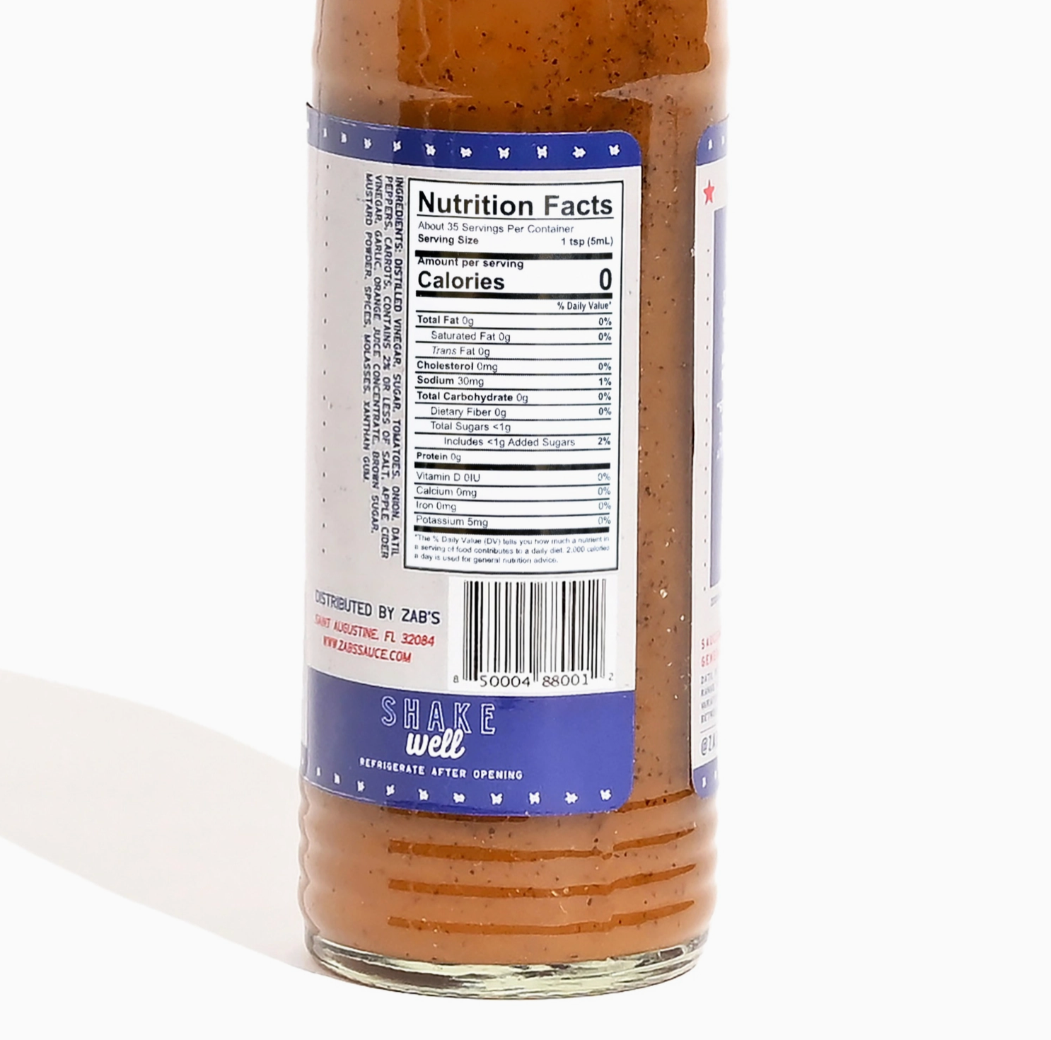Bottle with a nutrition facts label on a white background