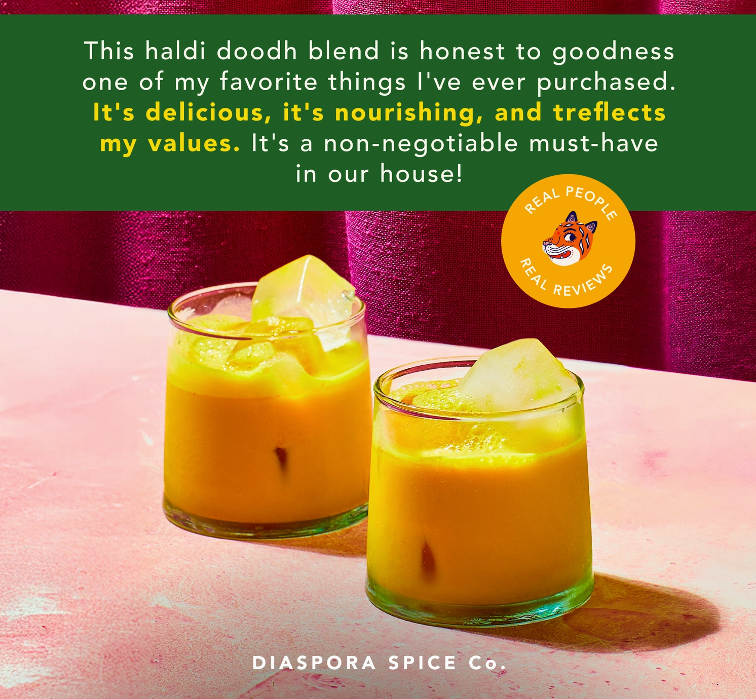 Two glasses of yellow-orange haldi smoothie with ice on a pink surface, with a dark green text banner at the top and a circular 'Real People Real Reviews' badge. Brand name Diaspora Spice Co.