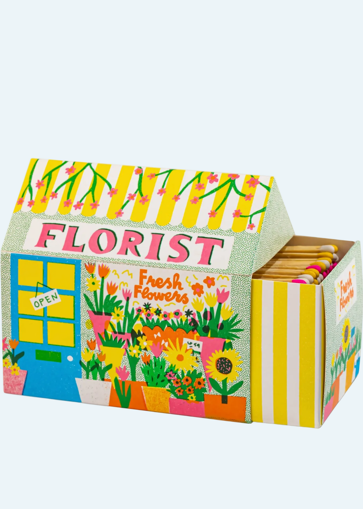 A decorative floral matchbox-style box labeled 'FLORIST' with colorful illustrated flowers, green leaves, yellow stripes, and a small window graphic