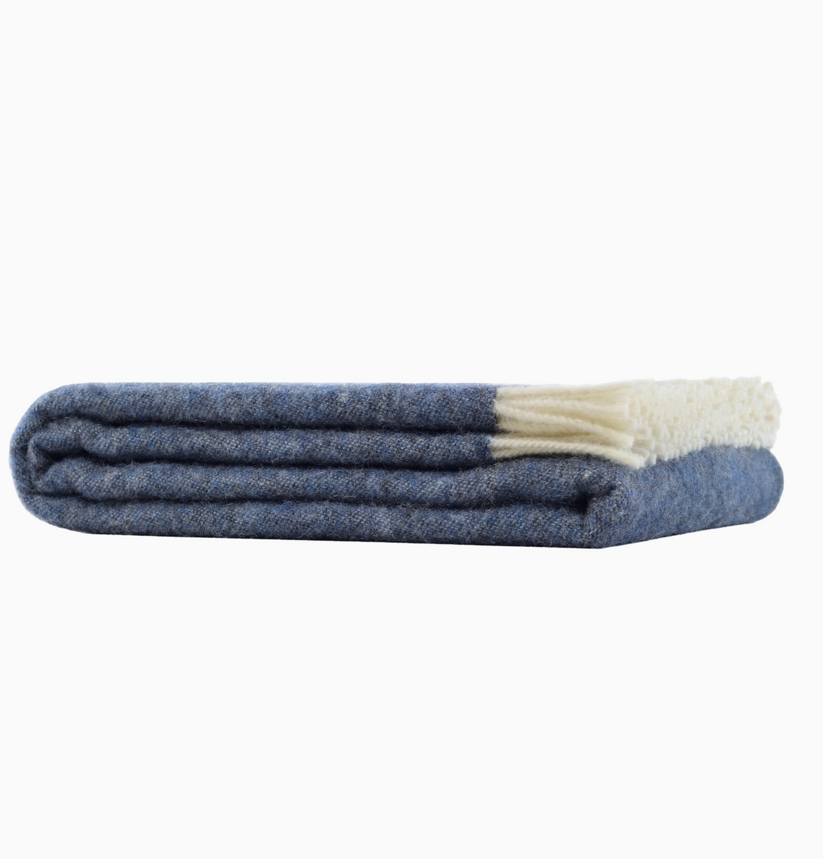 dark blue blanket with fringe and sheep design folded