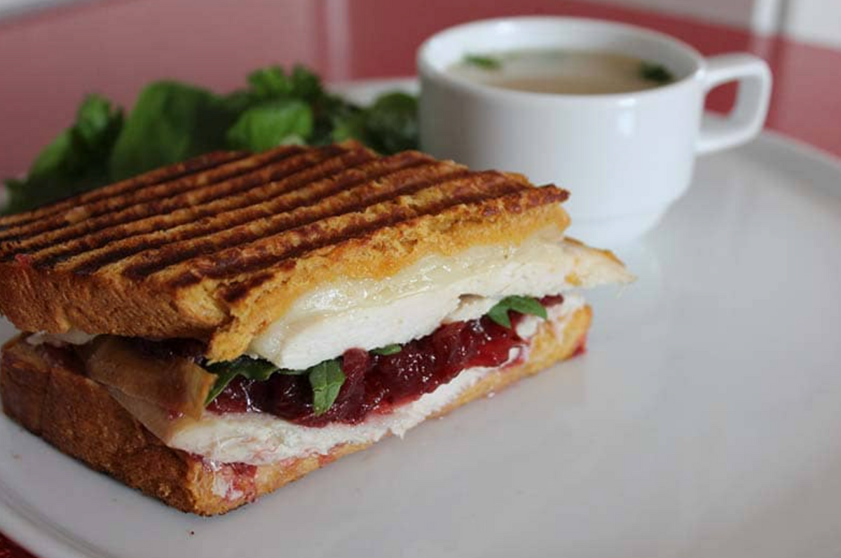 turkey sandwich featuring compoto