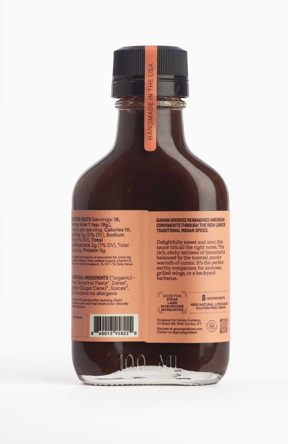 Back view of a dark brown glass bottle 