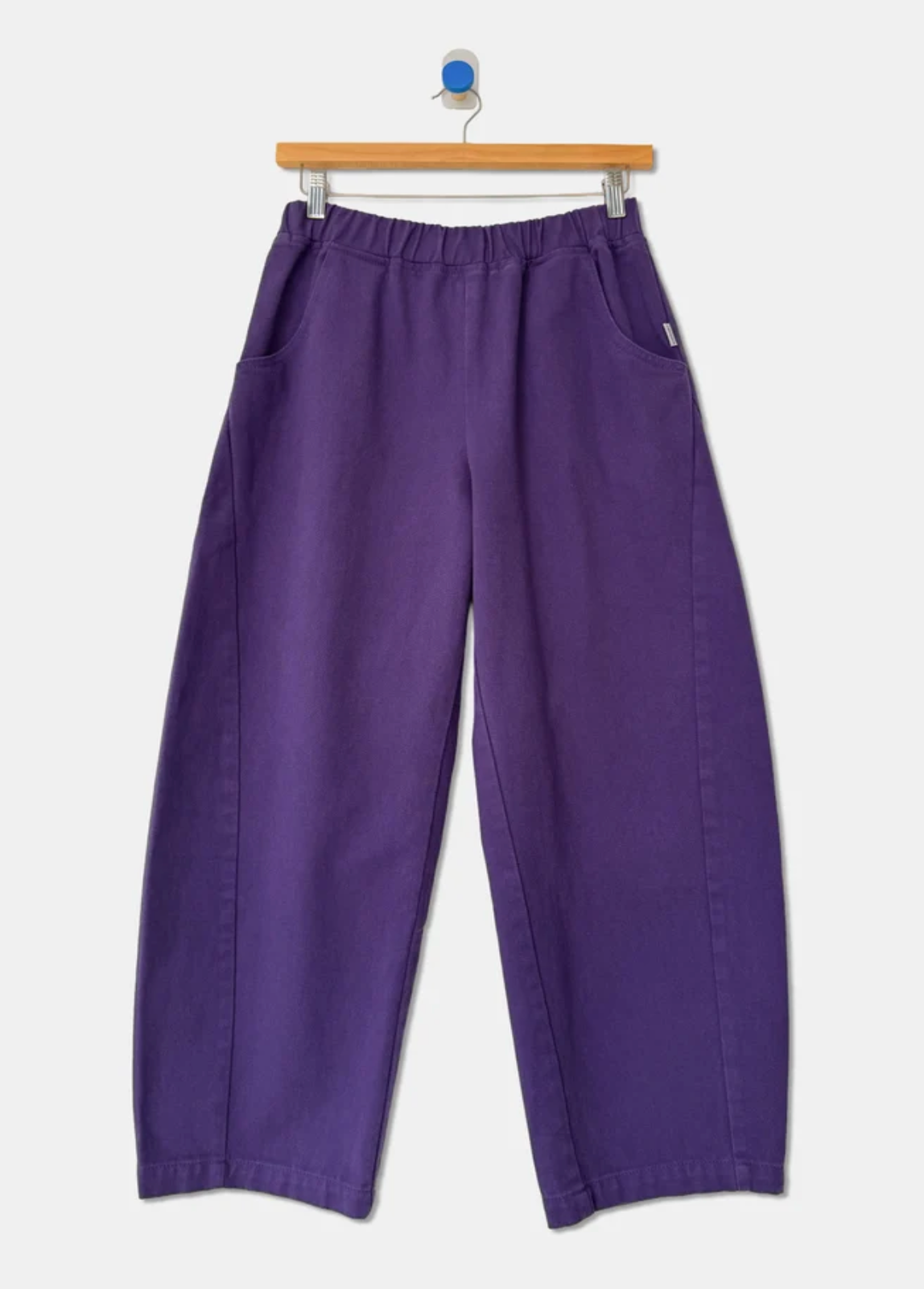 purple pant flat lay 