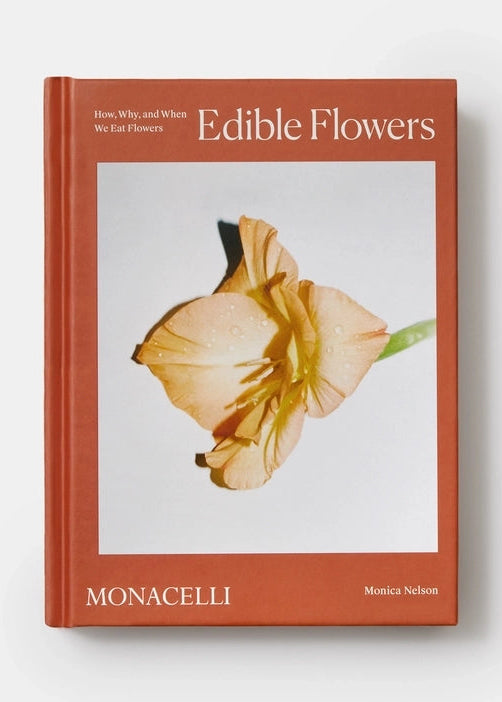 Book titled 'Edible Flowers' by Monacelli on a white background