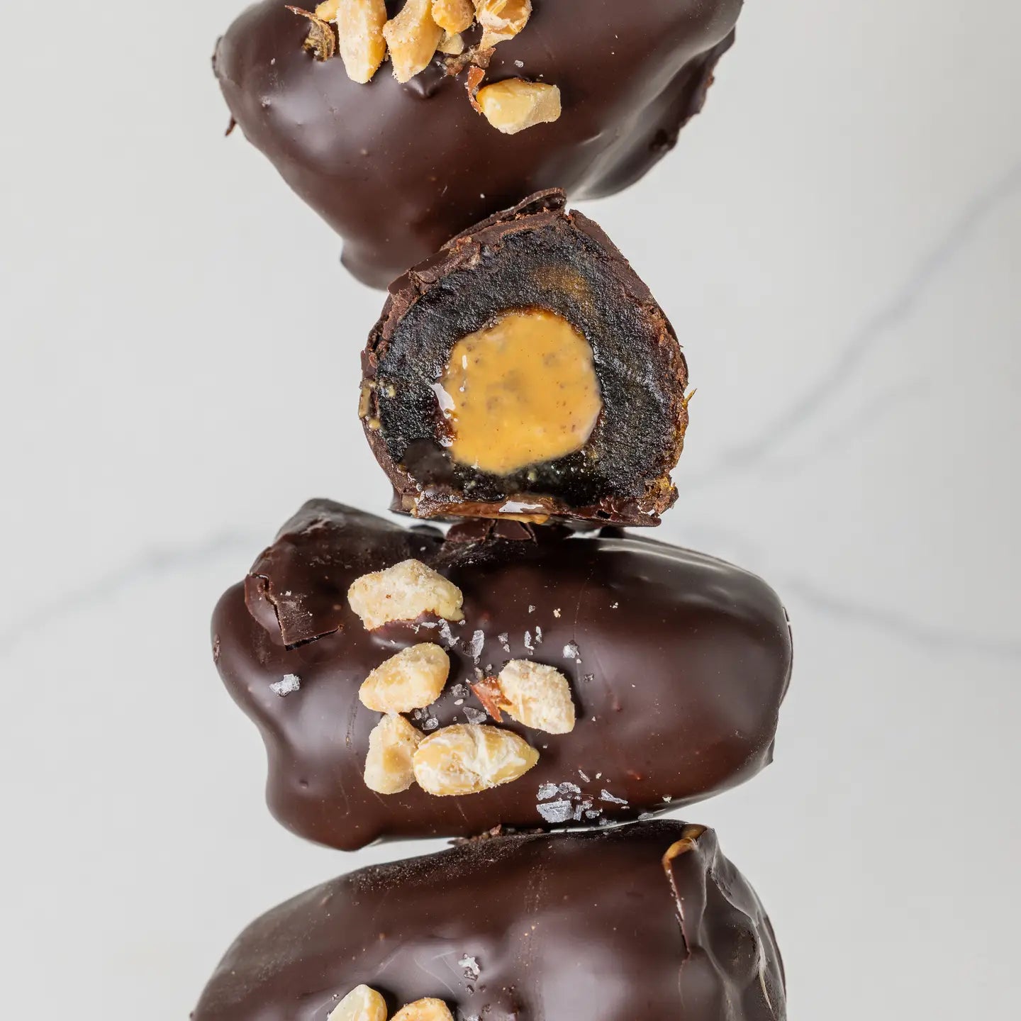 chocolate covered dates stuffed w peanut butter