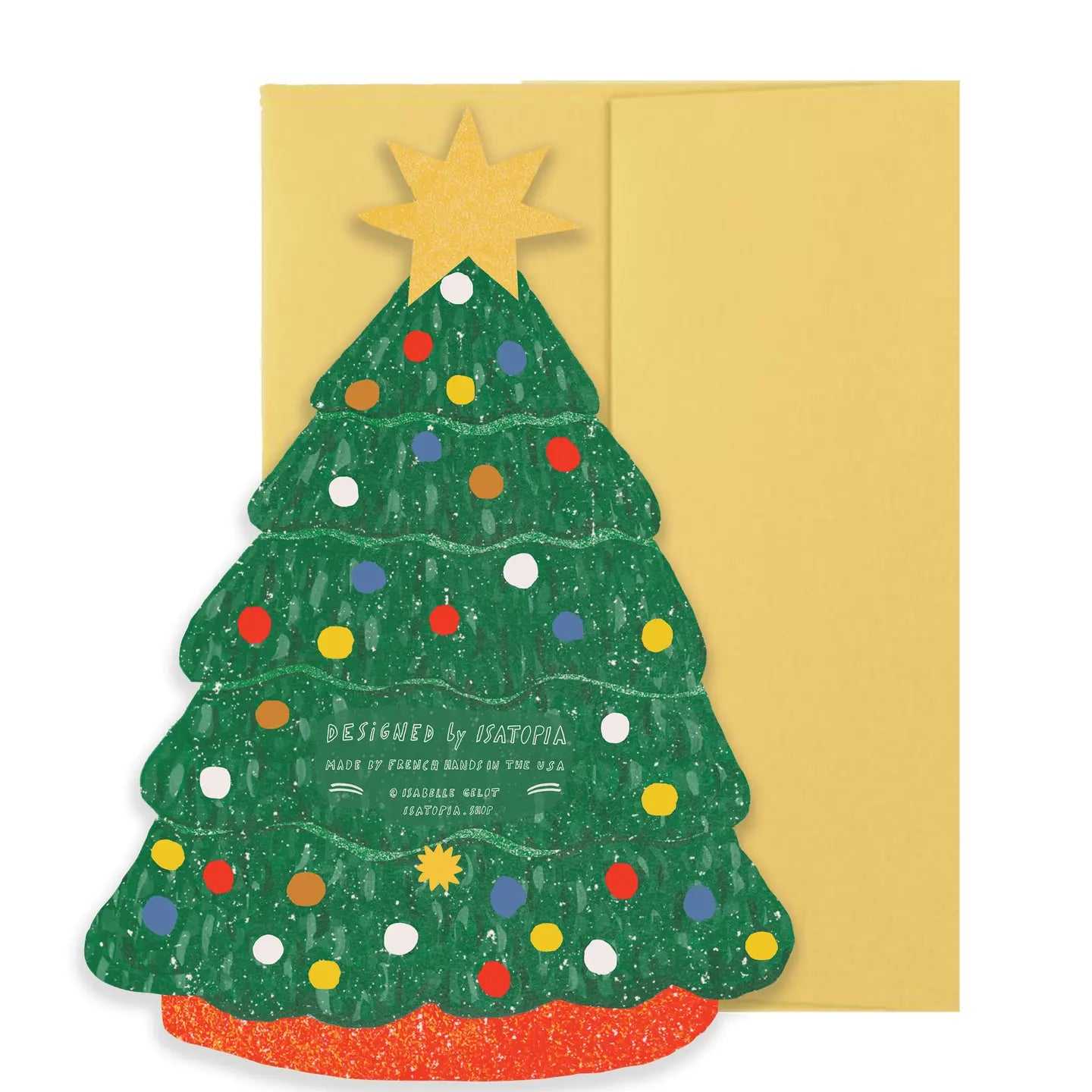 A Christmas tree card with a green glittery tree, multicolored ornaments, a gold star topper, and an orange base, shown with a gold envelope behind it on a white background.