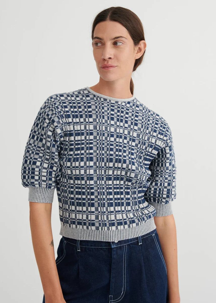 blue grey checkered pattern top on model