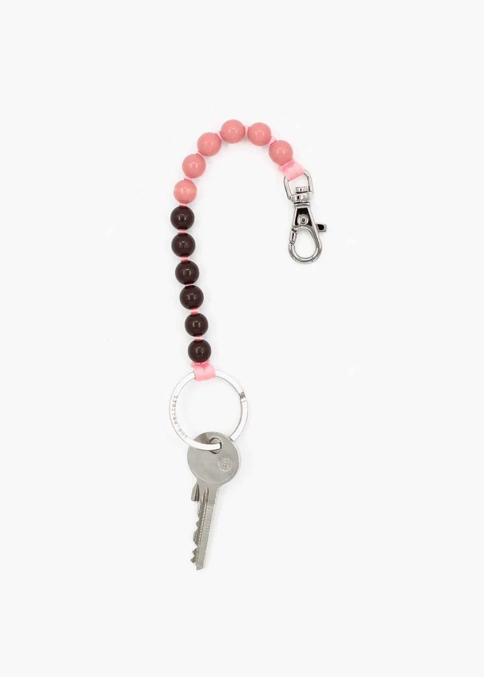 pink and brown beads making a keychain